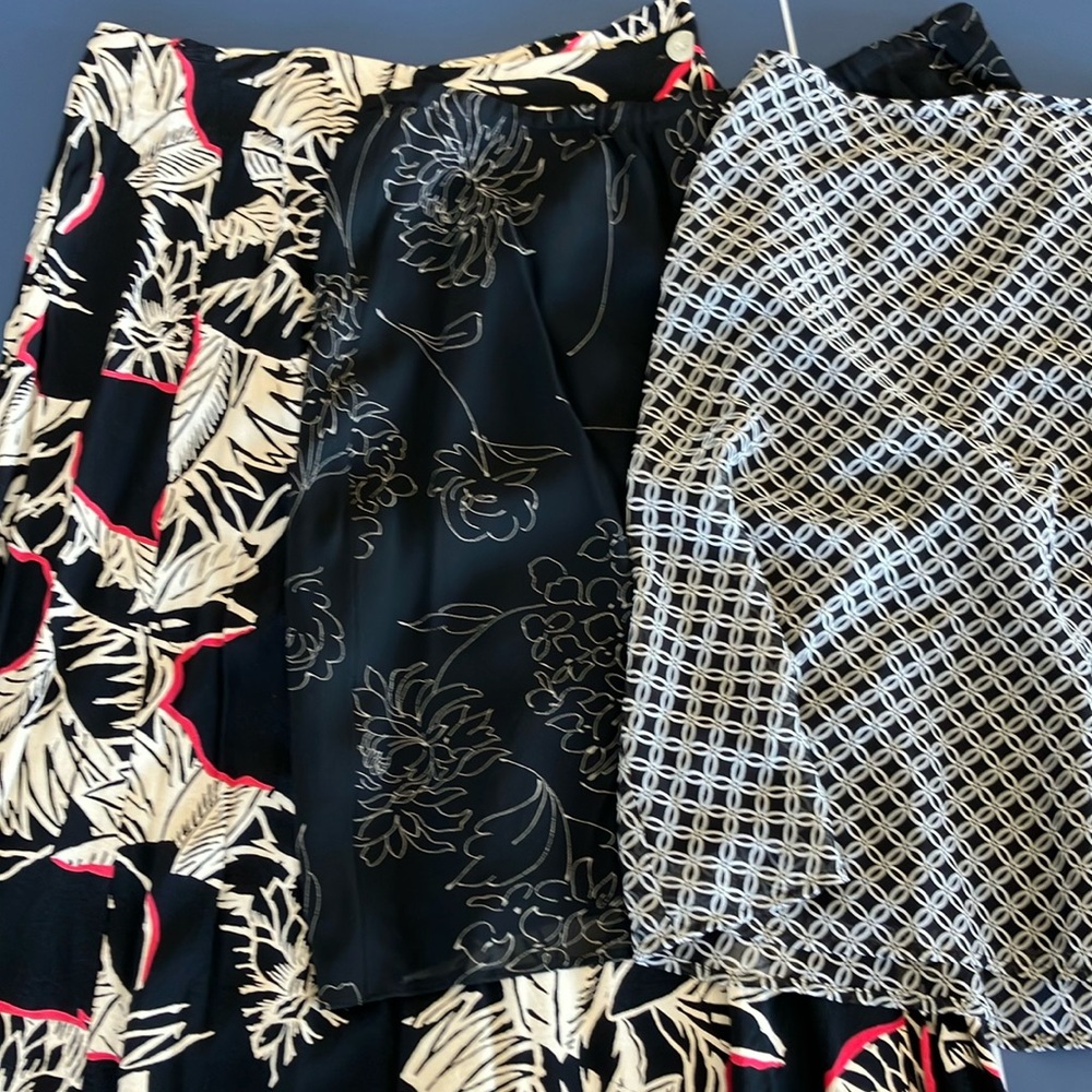 3 floral black mini skirts